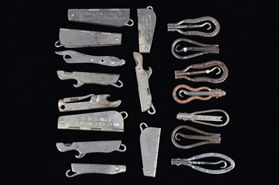 Lot 448 - A collection of steel hinged retractable advertising button hooks