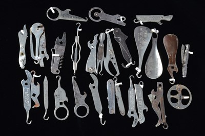 Lot 458 - A collection of stainless stell advertising multi tools containing button hooks