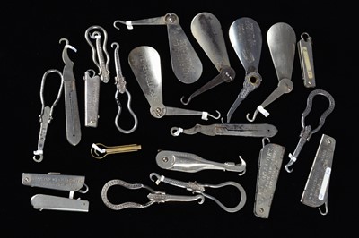 Lot 459 - A collection of retractable hinged advertising steel button hooks