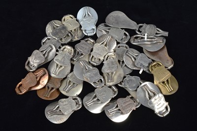 Lot 490 - A collection of steel and brass 19th Century folding commemorative or souvenir shoehorn button hooks