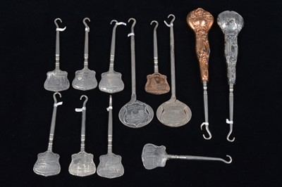 Lot 493 - A collection of souvenir button hooks