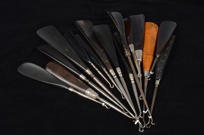 Lot 500 - Fifteen combination antique shoehorn and button hooks