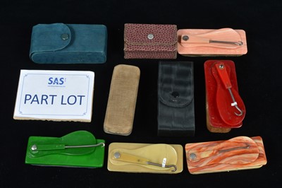 Lot 506 - A collection of plastic combination swivel hinged button hooks