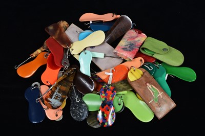 Lot 508 - A collection of plastic loop attached button hooks and shoehorns