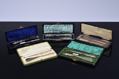 Lot 511 - Five cased silver handled button hook and shoehorn sets