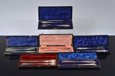 Lot 514 - Six cased silver handled button hook and shoehorn sets