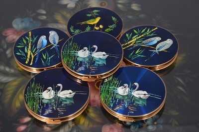 Lot 525 - Six 1960s circular gilt metal and coloured enamel decorated Stratton compacts