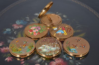 Lot 530 - Six 1960s circular gilt metal and coloured enamel decorated Stratton compacts