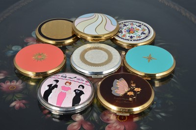 Lot 535 - Eight 1960s circular gilt metal, chromed and coloured enamel decorated Stratton compacts