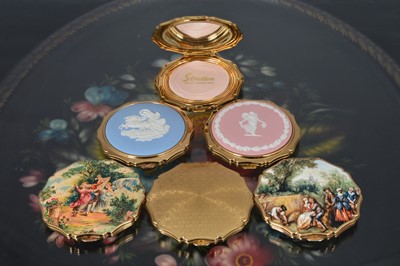 Lot 539 - Six 1960s and later scalloped edged circular gilt metal, chromed and coloured enamel Stratton compacts