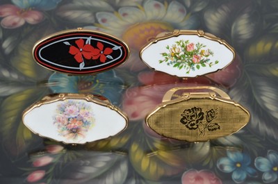 Lot 540 - Four 1970s Stratton 'Lipview' lipstick compacts