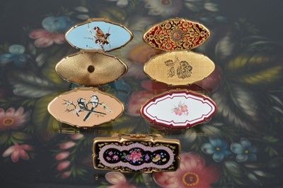 Lot 541 - Seven 1970s gilt metal Stratton lipstick compacts