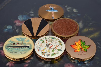 Lot 542 - Six 1960s circular gilt metal and coloured enamel decorated Stratton compacts