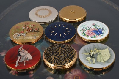 Lot 547 - Five 1960s and later circular gilt metal and chromed coloured enamel decorated Stratton compacts