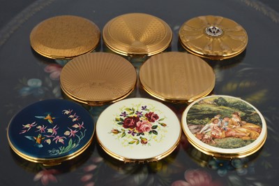 Lot 553 - A collection of eight 1970s and later Kigu gilt metal circular compacts