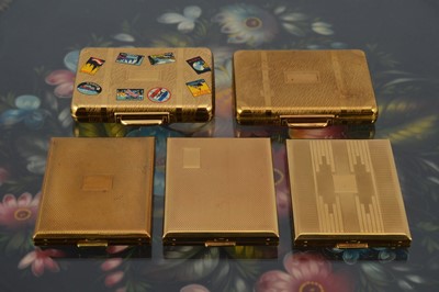 Lot 561 - Two 1950s Kigu gilt metal Bon Voyage compacts