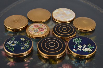 Lot 570 - Nine 1950s and later Melissa circular gilt metal compacts