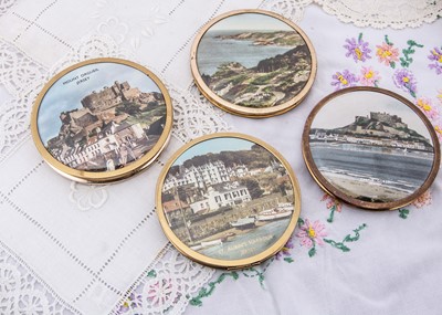 Lot 572 - Four circular souvenir compacts