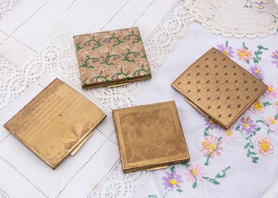 Lot 574 - Three Zenette gilt compacts