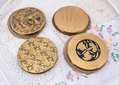 Lot 579 - Four circular gilt metal Zenette powder compacts