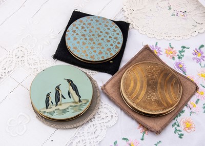 Lot 581 - Three gilt metal probably Le Rage circular compacts