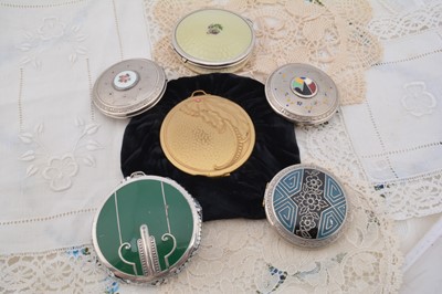 Lot 605 - Six 1930s and later circular Evans compacts