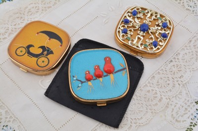 Lot 606 - Three square 1940s Evans compacts