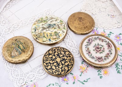 Lot 618 - Five gilt metal circular Kigu compacts