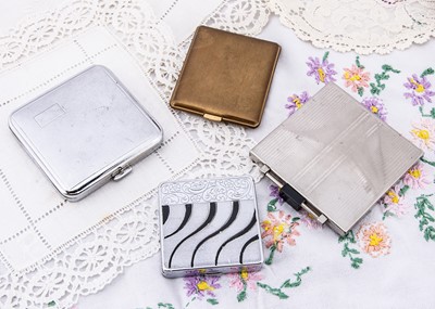 Lot 620 - Three vintage chrome and one brass compacts