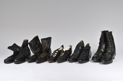 Lot 666 - A pair of Edwardian black leather shoes with jet beading