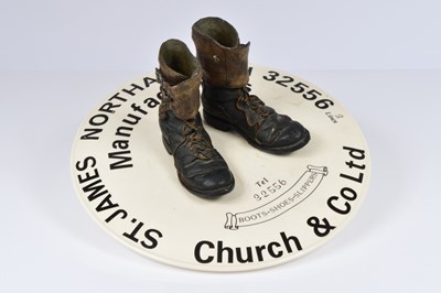 Lot 675 - A vintage advertising plaque