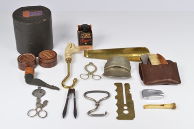 Lot 677 - A vintage carved dog head boot hook