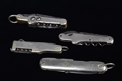 Lot 693 - A group of four Multi-Tools/pocket knives