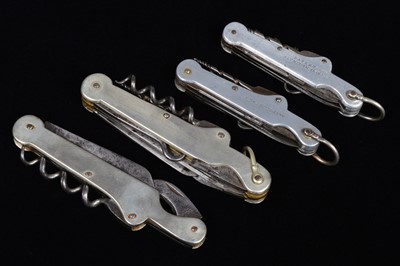 Lot 697 - A group of four Thomas Turner & Co Multi-Tools/pocket knives