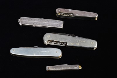 Lot 699 - A group of five Multi-Tools/Pocket Knives