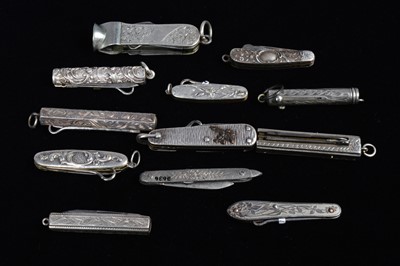 Lot 700 - An assortment of white metal Multi-Tool/Pocket Knives