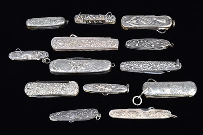Lot 701 - A collection of white metal Multi-Tools and Pocket Knives
