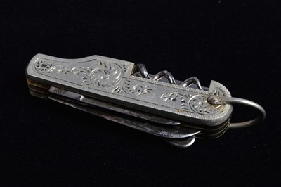 Lot 702 - An assortment of base metal and white metal Multi-Tools/Pocket Knives