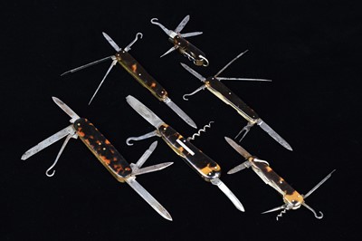 Lot 708 - A group of six Tortoiseshell Scale Multi-Tool/Penknife