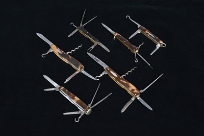 Lot 709 - A group of six Tortoiseshell Scale Multi-Tool/Penknife