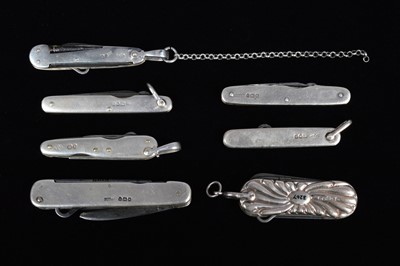 Lot 717 - A group of seven London Hallmarked Pocket knives/Multi-tools
