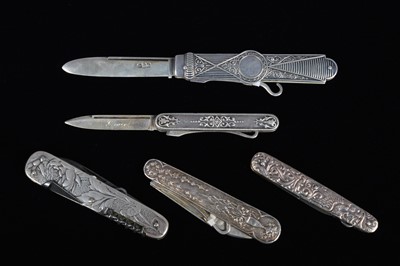 Lot 734 - A group of five Silver and White metal scaled Multi-tool/Pocket Knives