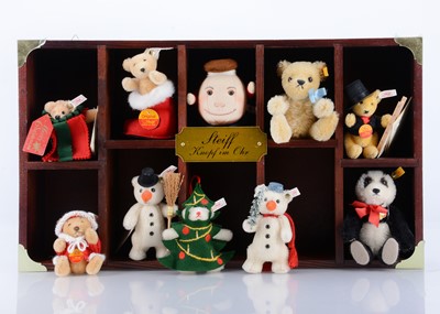Lot 29 - A Steiff Knopf Im Ohr (Button in the Ear) wall mounted display unit and collection of ten Steiff teddy bears/ soft toys