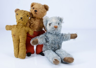 Lot 65 - Three unjointed teddy bears