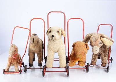 Lot 118 - Five push-along animals