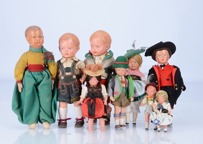 Lot 144 - Nine celluloid dolls in national costumes