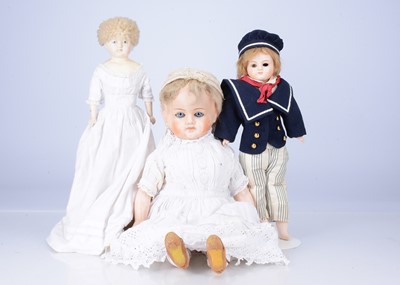 Lot 155 - A 19th century German papier-mache turned shoulder-head doll