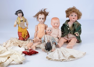Lot 160 - A quantity of bisque headed dolls