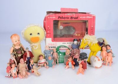 Lot 195 - A collection of small plastic and celluloid dolls