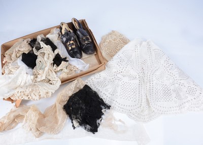 Lot 295 - A pair of late 19th or early 20th century shoes and lace